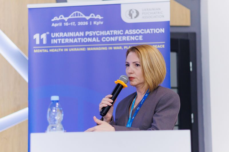 Під час симпозіуму. Виступ С. Камінської